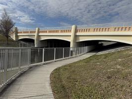 del-prado-linear-park-walkway-under-bridge