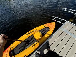 sirenia-vista-with-kayak-in-water-at-dock