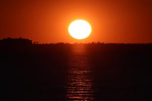 yacht-club-public-beach-setting-sun