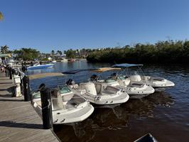  a-picturesque-view-of-a-boat-exploring-the-scenic-canals-of-cape-coral-florida 